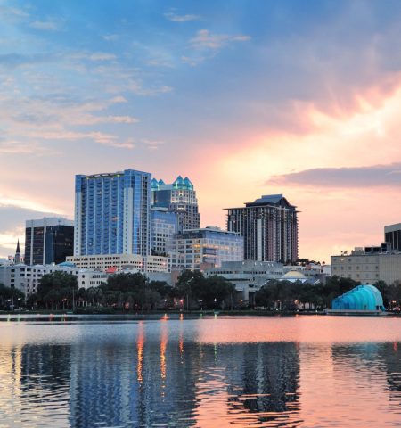 Orlando Lake Eola sunset with urban architecture skyline and colorful cloud